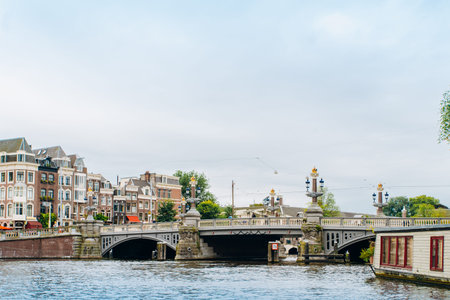 Amsterdam, Netherlands September 5, 2017: Magere Brug Bridge and Amstel river.