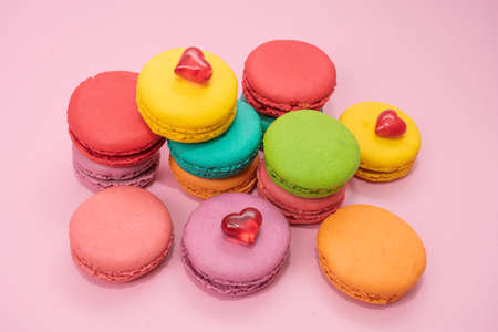 colorful almond cookies  on pink backgroundの写真素材