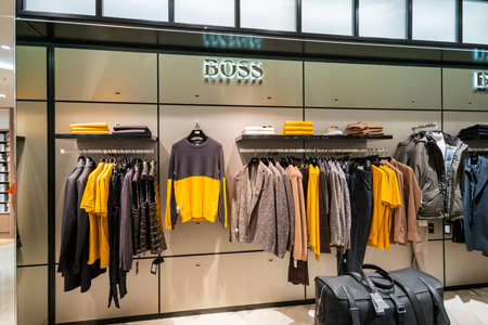 DUSSELDORF, GERMANY - 19 OCTOBER, 2019: Interior shot of Hugo Boss store in Breuninger luxury shopping mall at Schadowplatz in city center Dusseldorf, Germanyのeditorial素材