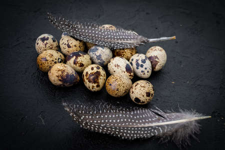 quail eggs  on dark old  backgroundの写真素材