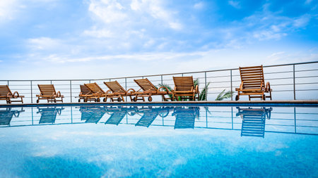 swimming pool near luxury villa. Sunny summer vacation