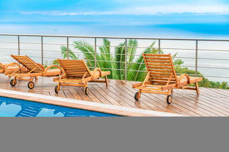 swimming pool near luxury villa. Sunny summer vacationの写真素材