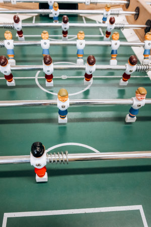 Table football game with red and blue players. Football game.