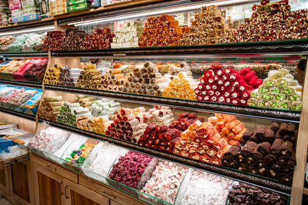 Turkish sweets in the Egyptian bazaar. Istanbul. A lot of sweets on the counter of the store.の写真素材
