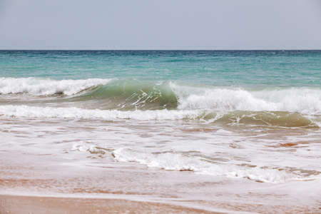 Beautiful sea waves. Waves on a Sunny day. View of the waves from aboveの写真素材