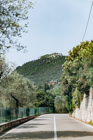 Scenic road in near the mountains. Picturesque view from the car window.