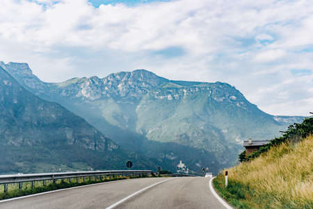 Scenic road in near the mountains. Picturesque view from the car window.の写真素材