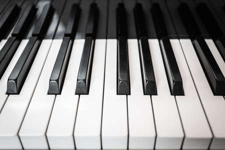 Close-up of black and white piano keys.の写真素材