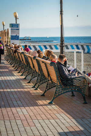 Sochi, Russia - January 15, 2020: Winter in Sochi. city Promenade with vacationing people on a Sunny dayのeditorial素材