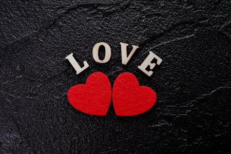 red hearts on black. concept of valentine day, love, wedding. 