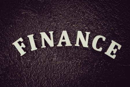 Finance concept. The finance word on black backgroundの写真素材