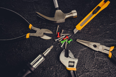 Tools for master builder on a black background