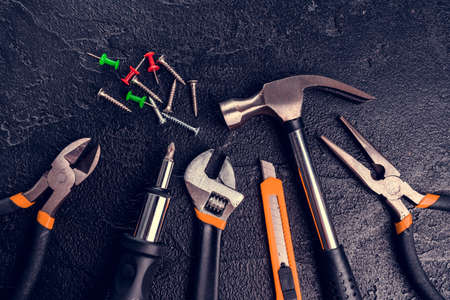 Many different tools for repair work on a black backgroundの写真素材