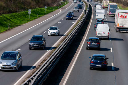 DUSSELDORF, GERMANY - March 22, 2019: Traffic on the highway. traffic with cars and trucksのeditorial素材