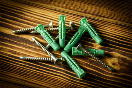 metal screw on wooden top tableの写真素材