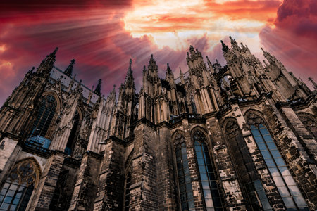 Germany, Cologne, view to Cologne Cathedral from below at sunset