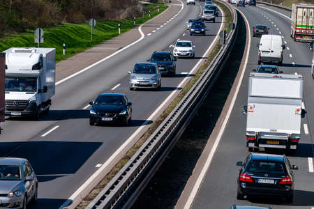 DUSSELDORF ,GERMANY - March 22, 2019: Highway transportation with cars and Trucksのeditorial素材
