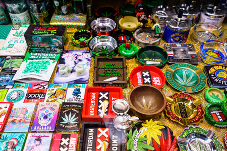 Amsterdam, Netherlands - November 16, 2021: Cannabis smoking equipment for sale in shop....