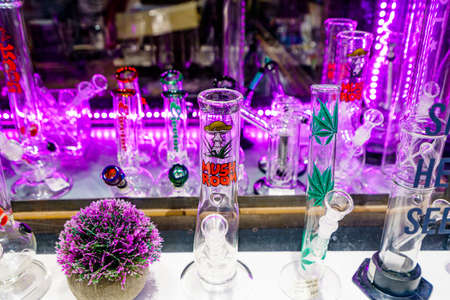 Amsterdam, Netherlands - November 16, 2021: Cannabis smoking equipment for sale in shop. Recreational use of cannabis is allowed in some countries but not othersのeditorial素材