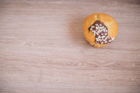 Hot coffee mug on a wood tableの写真素材