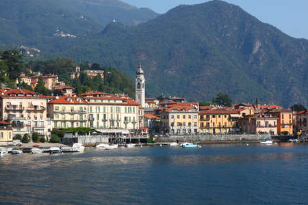 View from ferry of city Menaggio on lake Como in Italyの写真素材