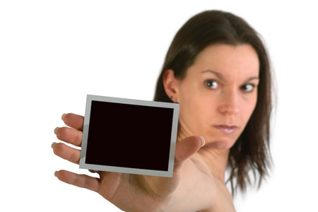 Young woman holding a pictureの写真素材