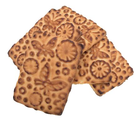 Pile of the crispy cookies on a white backgroundの写真素材