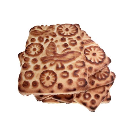 Pile of the crispy cookies on a white backgroundの写真素材