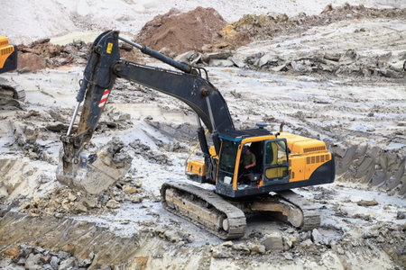 heavy machinery works in industrial quarry