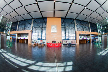 Donetsk, Ukraine, June 2012. View inside the terminal building of the international Prokofiev airport of Donetsk. People sitting in a cafe. Fisheye lensのeditorial素材