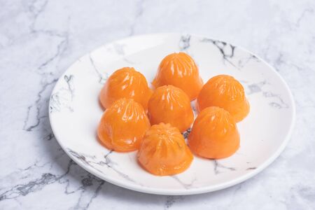 Ready-made colored dumplings on a plateの写真素材