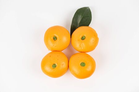 Cute pork buns in a form of oranges
 on white backgroundの写真素材