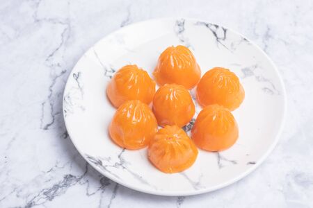 Ready-made colored dumplings on a plateの写真素材