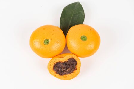 Cute pork buns in a form of oranges, top viewの写真素材
