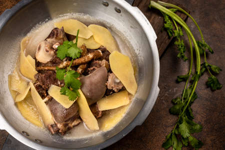 Chinese cuisine, dry fried mutton with potato chipsの写真素材