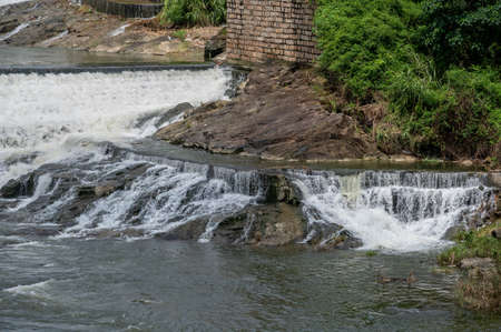Rocks and water by the riverの写真素材