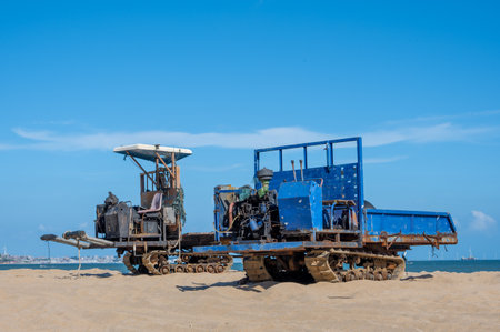 Old fishing machines parked on the beachの写真素材