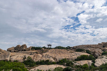 Desolate mountains, many grotesque large stones and few plantsの写真素材