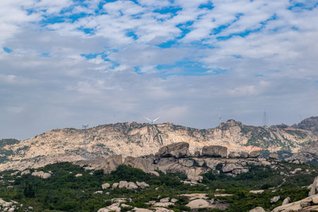 Desolate mountains, many grotesque large stones and few plants