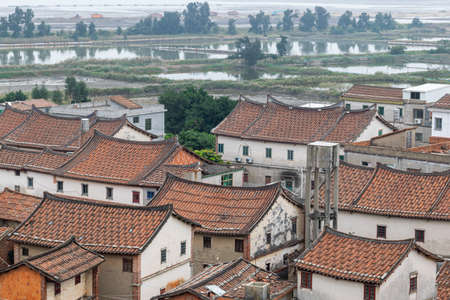 Chinese style house made of red tiles and bricksの写真素材