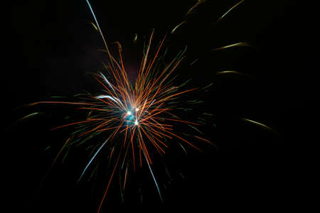 Beautiful fireworks blooming in the night skyの写真素材