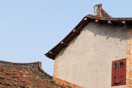 Chinese traditional architecture with red bricks and tilesの写真素材