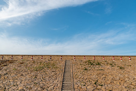 The dyke of the sea under the blue sky