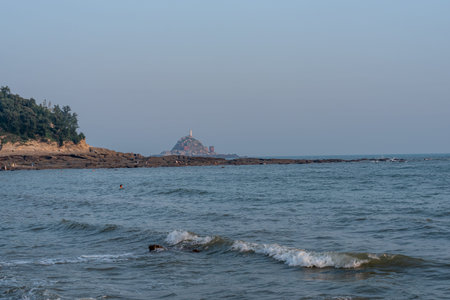 The sea, waves, islands and beaches at dusk.の写真素材