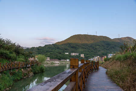 A pavilion by the lake in the countryの写真素材