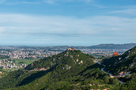 The mountain overlooks the rich villages and towns