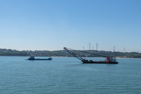 The ocean under the blue sky, the ship staying at the dock or the seaの写真素材