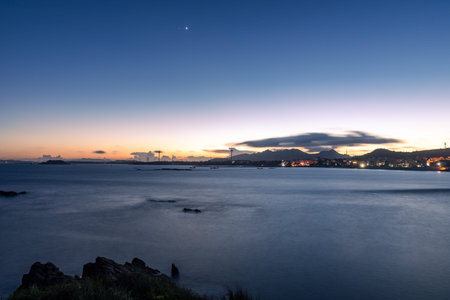 In the evening, the sea slapped the rocks