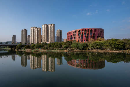 The stream reflects the Putian Museum of China in the eveningのeditorial素材