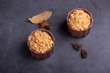 The refined meat floss is in the cup in the dark backgroundの写真素材